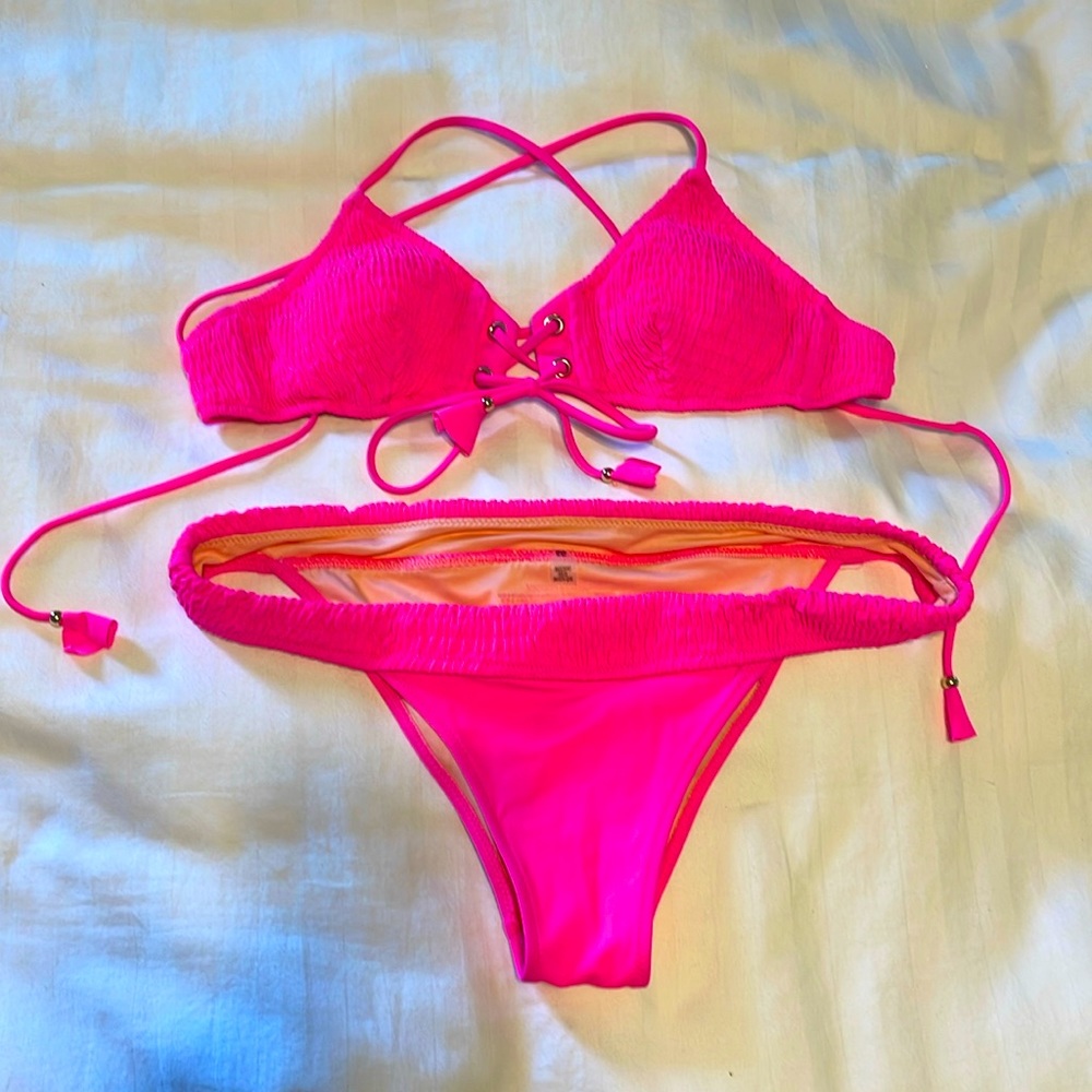 Victoria’s Secret women’s size small top/medium bottoms pink bikini swimsuit